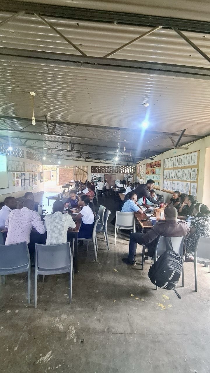 Teachers participating in small-group activities during a pedagogical workshop
