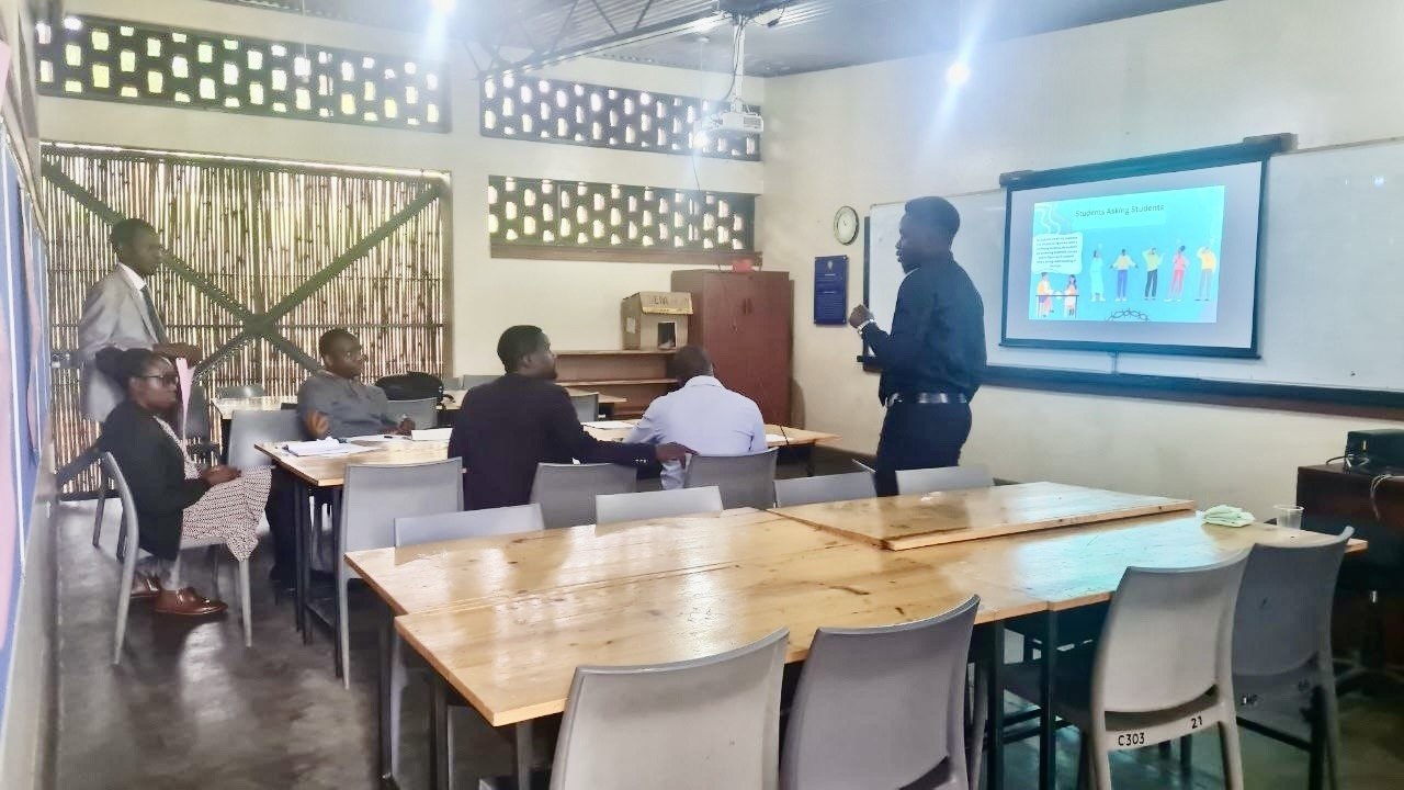 Solomon Tatwebwa presenting to teachers during a pedagogical training session